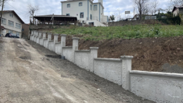 Yeni Mahalle Mimir Semtinde Perde Duvar Yapımı Devam Ediyor